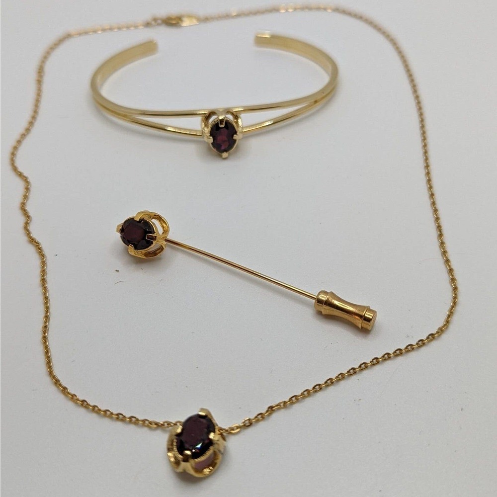 Necklace, pin and bracelet